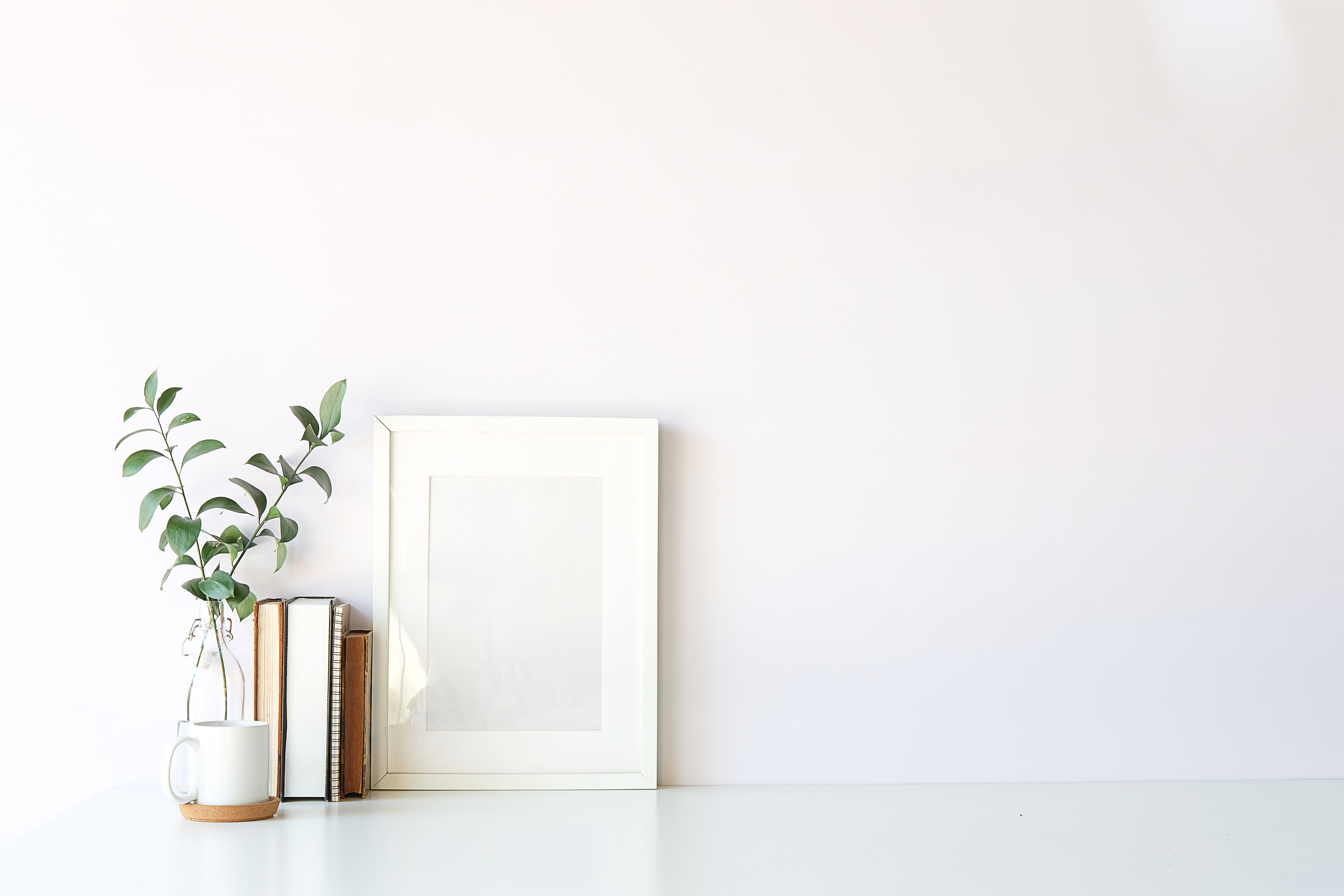 Workspace with Books and Plant
